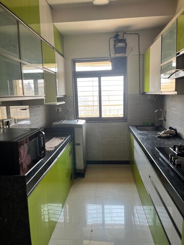 Kitchen in 2 BHK Apartment at Acme Ozone, Manpada – for Rent