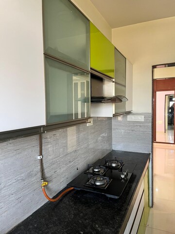 Kitchen in 2 BHK Apartment at Acme Ozone, Manpada – for Rent