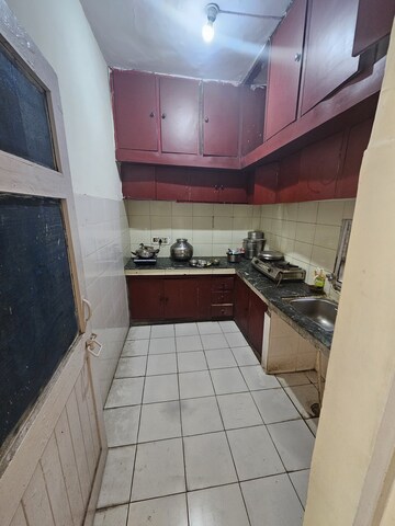 Kitchen in 2.5 BHK Apartment at Vasundhara Enclave – for Rent