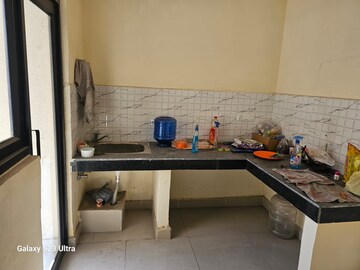 Kitchen in 2 BHK Apartment at Charms Castle, Raj Nagar Extension – for Sale