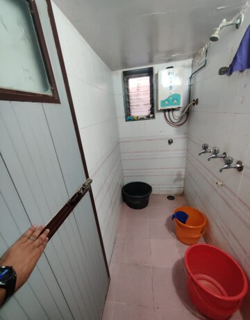Bathroom in 1 BHK Apartment at Asmita Mogra CHS, Andheri East – for Rent