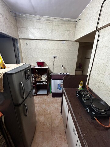 Kitchen in 1 BHK Apartment at Green Fields Apartment, Andheri East – for Rent
