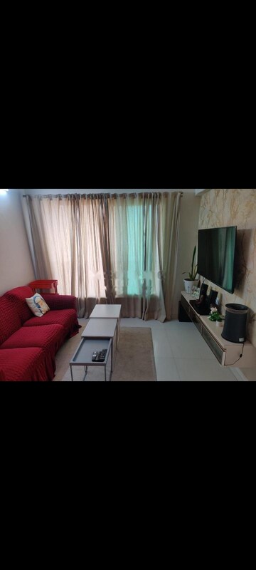 Living Room in 2 BHK Apartment at Rustomjee Urbania, Majiwada – for Rent