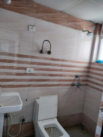 Bathroom in 2 BHK Apartment at Ansal Royal Heritage, Sector 70 – for Rent