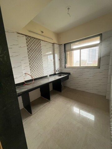 Kitchen in 1 BHK Apartment at Mohan Willows, Badlapur East – for Rent