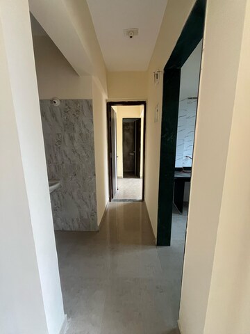 Building Lobby in 1 BHK Apartment at Mohan Willows, Badlapur East – for Rent