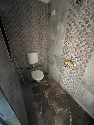 Bathroom in 1 BHK Apartment at Mohan Willows, Badlapur East – for Rent