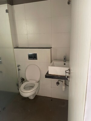 Bathroom in 2 BHK Apartment at Rustomjee Urbania, Majiwada – for Sale