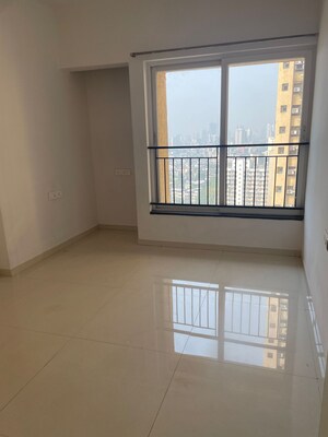 Room in 2 BHK Apartment at Rustomjee Urbania, Majiwada – for Sale