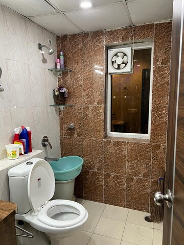Bathroom in 3 BHK Apartment at Unnati Fortune The Aranya, Sector 119 – for Rent