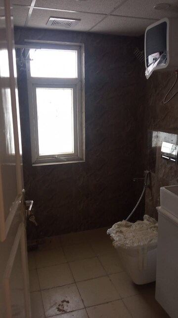 Bathroom in 3 BHK Apartment at Unnati Fortune The Aranya, Sector 119 – for Rent