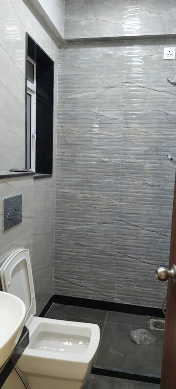 Bathroom in 3 BHK Apartment at Triumph Swastik, Malad West – for Rent