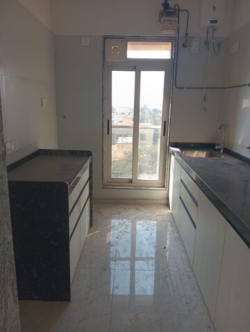 Kitchen in 3 BHK Apartment at Lotus Sky Garden, Malad West – for Rent