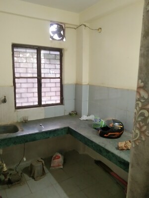 Kitchen in 1 BHK Apartment at UPAVP Brahmputra Enclave, Siddharth Vihar – for Sale