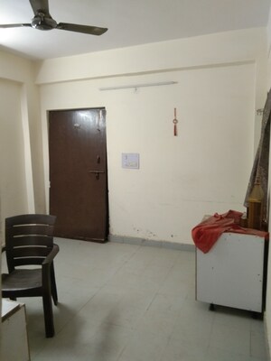 Living Room in 1 BHK Apartment at UPAVP Brahmputra Enclave, Siddharth Vihar – for Sale