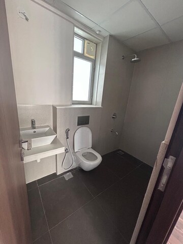Bathroom in 2 BHK Apartment at Piramal Vaikunth Vijit, Balkum Pada – for Rent