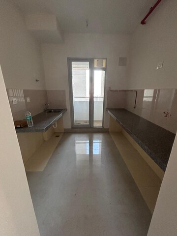 Kitchen in 2 BHK Apartment at Piramal Vaikunth Vijit, Balkum Pada – for Rent