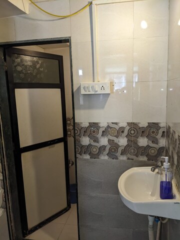 Bathroom in 1 BHK Apartment at Hill Palace CHS Ltd, Pokhran Road No 1 – for Rent