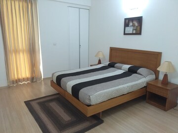 Bedroom in 4 BHK Apartment at DLF Park Place, Sector 54 – for Rent