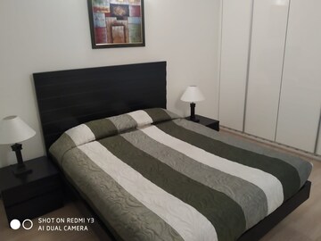 Bedroom in 3 BHK Apartment at DLF Park Place, Sector 54 – for Rent