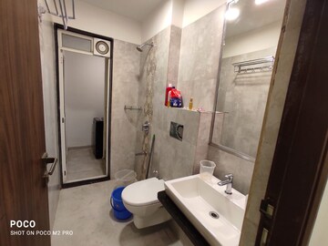 Bathroom in 2 BHK Apartment at Omkar Alta Monte, Malad East – for Rent