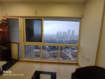 Living Room in 2 BHK Apartment at Omkar Alta Monte, Malad East – for Rent
