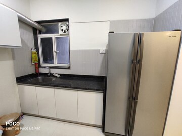 Kitchen in 2 BHK Apartment at Omkar Alta Monte, Malad East – for Rent