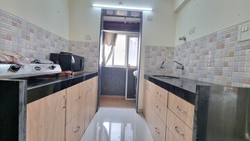 Kitchen in 1 BHK Apartment at Vikas Park CHS, Malad West – for Rent