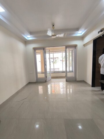 Living Room in 1 BHK Apartment at Nalanda CHS Malad , Malad West – for Rent