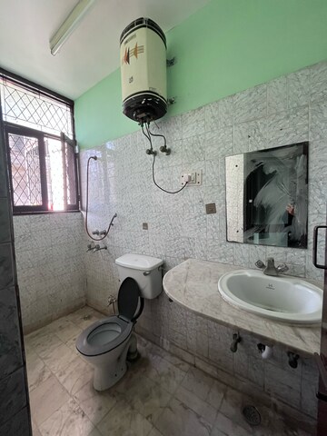 Bathroom in 2 BHK Builder Floor at Ansal Sushant Lok I, Sector 43 – for Rent