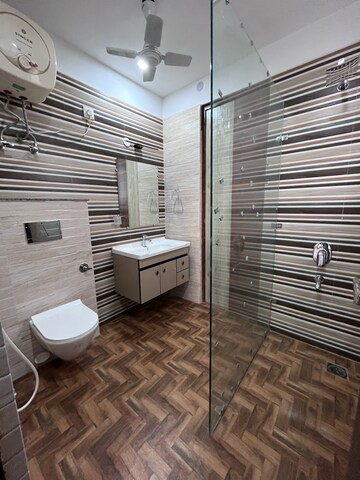 Bathroom in 4 BHK Builder Floor at Ansal Sushant Lok I, Sector 43 – for Rent