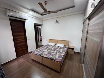 Bedroom in 4 BHK Builder Floor at Ansal Sushant Lok I, Sector 43 – for Rent