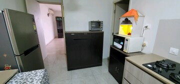 Kitchen in 3 BHK Apartment at Hiranandani Estate Rodas Enclave, Ghodbunder Road – for Rent