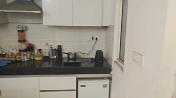 Kitchen in 1 BHK Apartment at Nimbus The Golden Palm, Sector 168 – for Rent