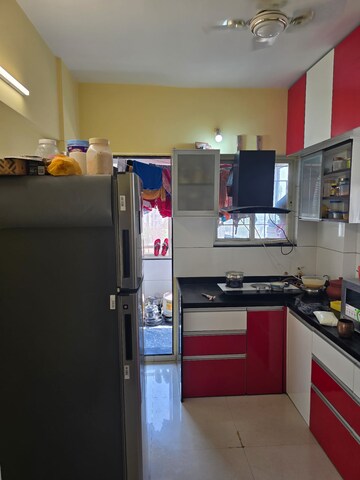 Kitchen in 2 BHK Apartment at Suyog Nisarg, Wagholi – for Sale