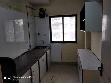 Kitchen in 2 BHK Apartment at K Raheja Palm Court, Malad West – for Rent