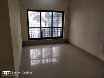 Room in 2 BHK Apartment at K Raheja Palm Court, Malad West – for Rent