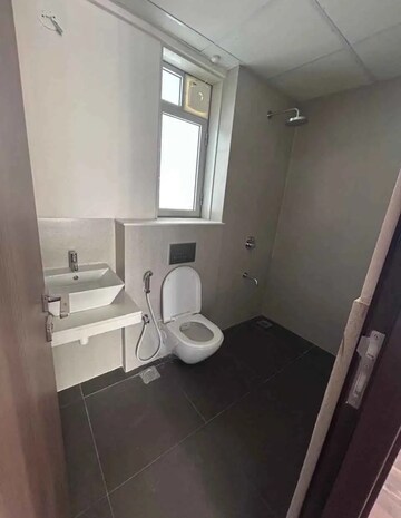 Bathroom in 2 BHK Apartment at Piramal Vaikunth, Balkum Pada – for Rent