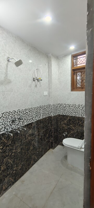 Bathroom in 3 BHK Builder Floor at Dwarka Mor – for Sale
