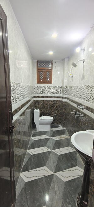 Bathroom in 3 BHK Builder Floor at Dwarka Mor – for Sale