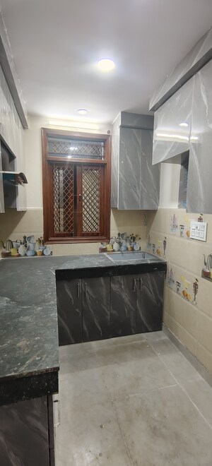 Kitchen in 3 BHK Builder Floor at Dwarka Mor – for Sale