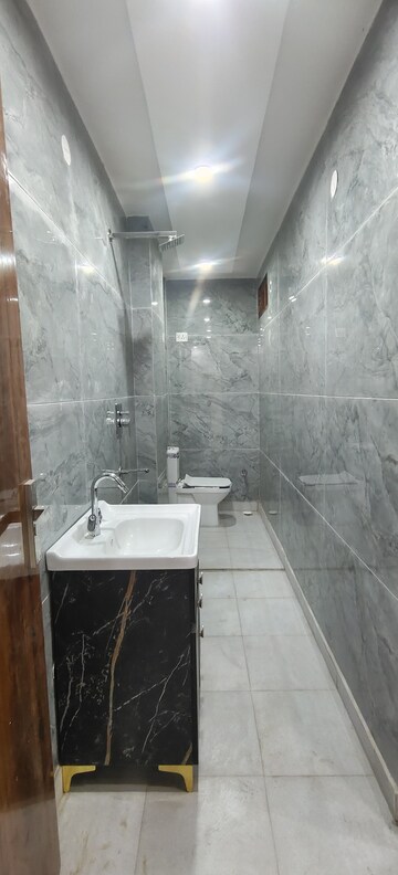 Bathroom in 3 BHK Builder Floor at Dwarka Mor – for Rent