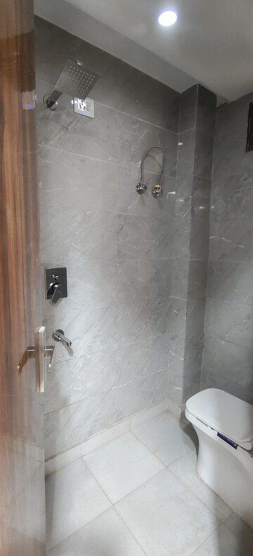 Bathroom in 3 BHK Builder Floor at Dwarka Mor – for Rent