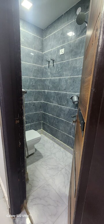 Bathroom in 3 BHK Builder Floor at Dwarka Mor – for Rent