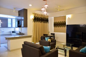 Living Room in 4 BHK Apartment at Emaar The Palm Drive-Palm Studios, Sector 66 – for Sale
