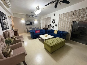 Living Room in 4 BHK Apartment at Emaar The Palm Drive-Palm Studios, Sector 66 – for Sale