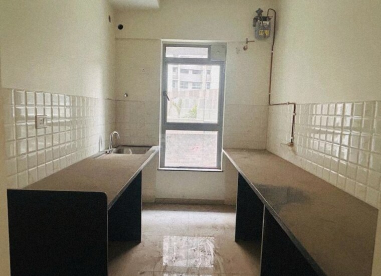 Kitchen, kalpataru-immensa 2 Bedroom 637 Sq.Ft. Apartment In Kolshet Road Thane 8429422