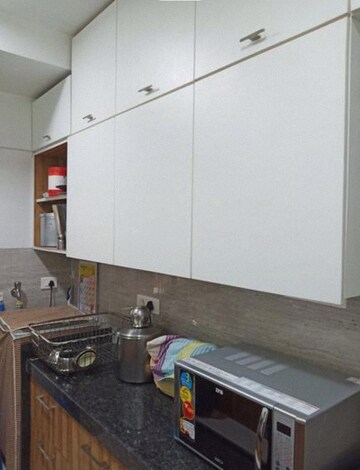 Kitchen in 3 BHK Apartment at Acme Ozone Phase II, Ghodbunder Road – for Rent