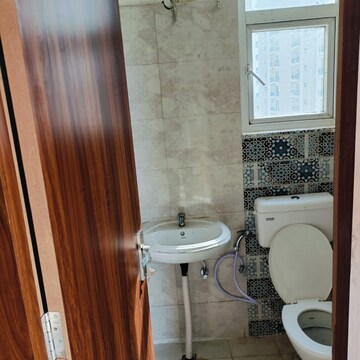 Bathroom in 2 BHK Apartment at Signature Global Proxima, Sector 89 – for Rent