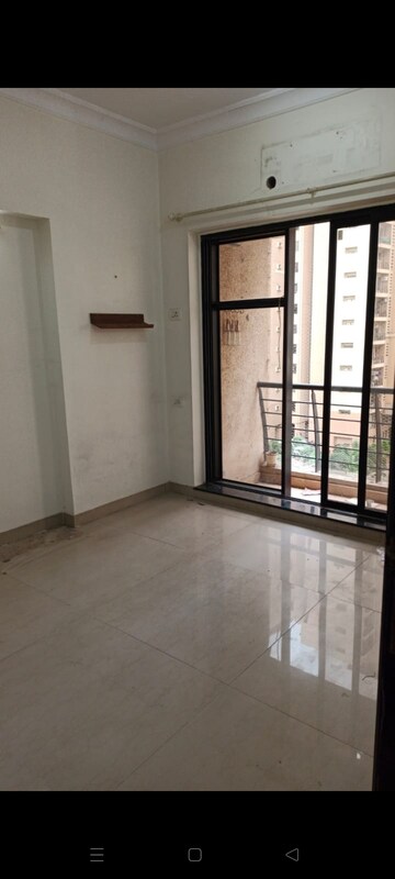 Room in 1 BHK Apartment at K Raheja Heights, Malad East – for Rent
